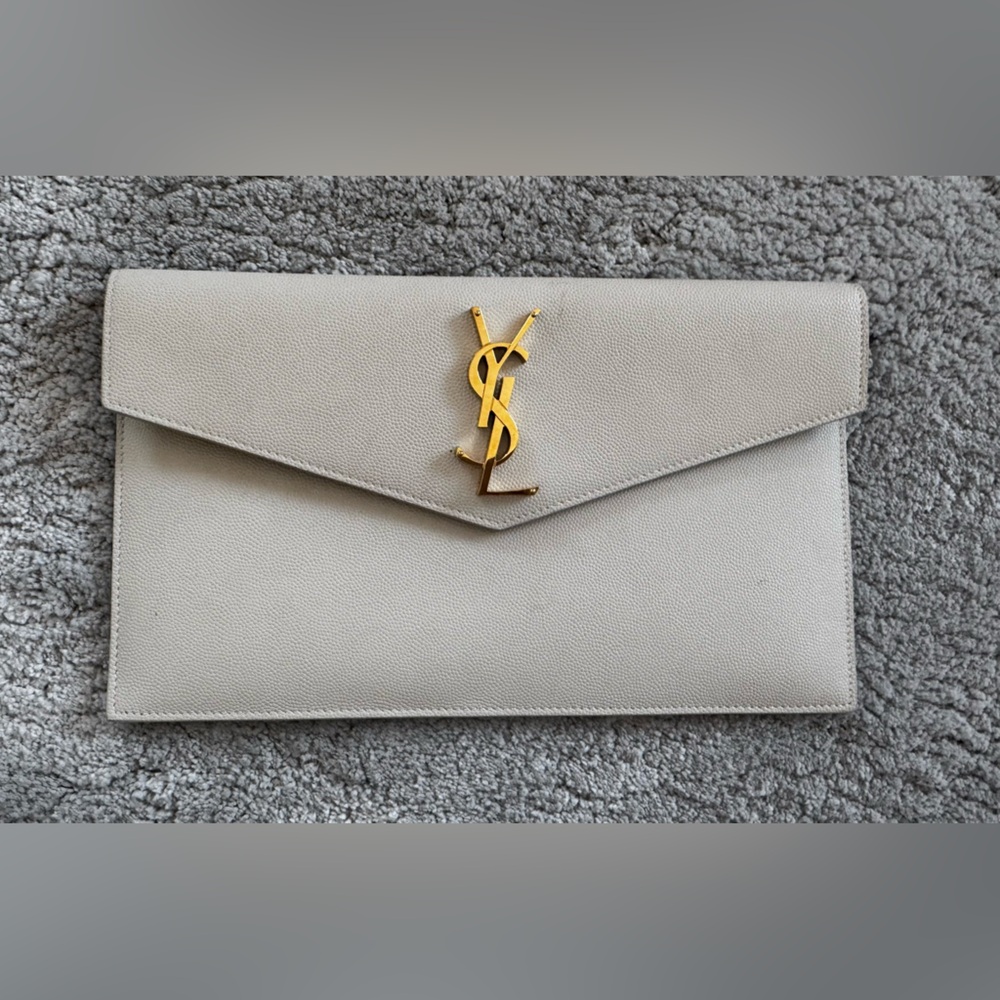 Saint Laurent Cream Clutch with Gold Logo
